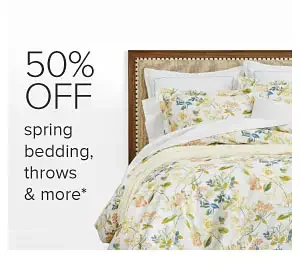 Image of various decorative pillows and blankets. 50% off spring bedding, throws and more.