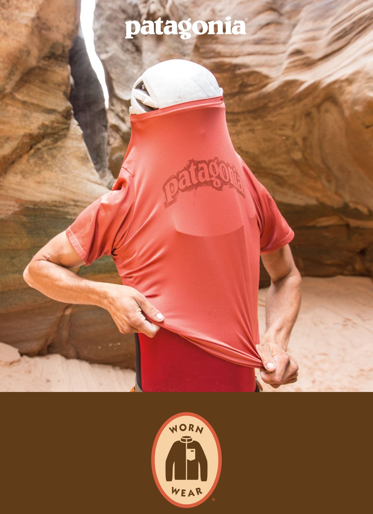 Patagonia Worn Wear. A person stretches the neck of their t-shirt trying to put it on over a helmet.