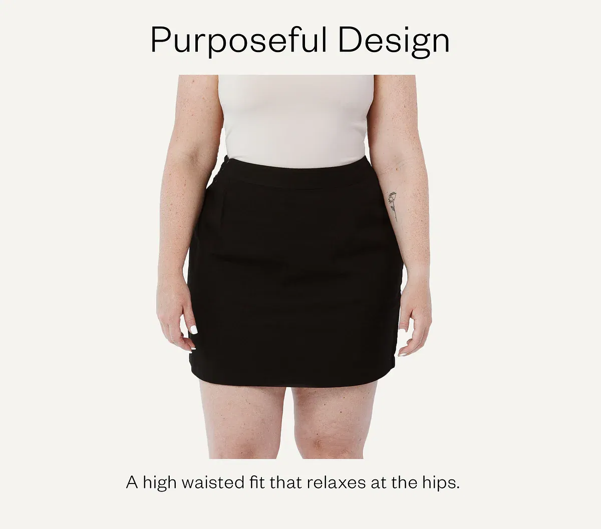 The Mini Skirt by Aam has a high waisted fit that relaxes at the hips.