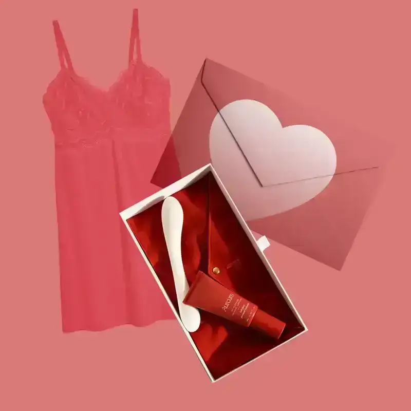 Best Sexy Gifts: a collage of Knix lingerie and Tabu Golden Hour Kit on a pink background with a heart envelope