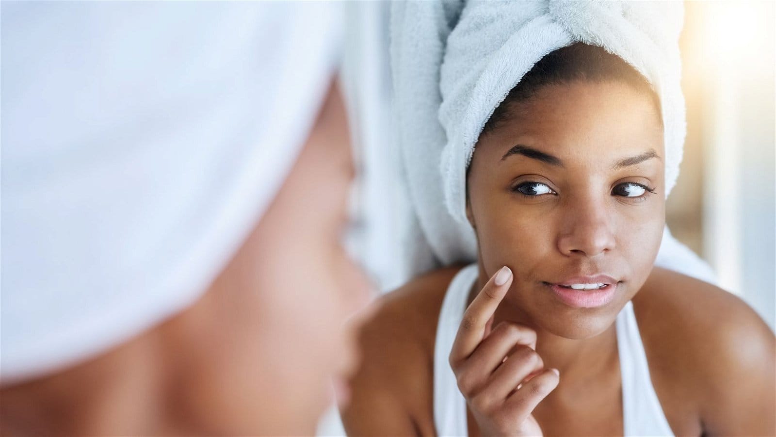 Lady cleaning her face