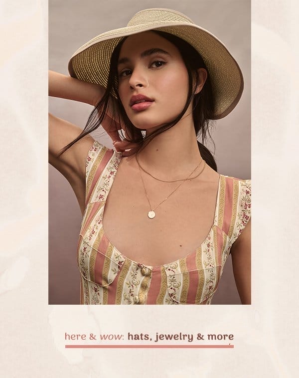 Woman in sun hat. Here and wow: hats, jewelry, and more.