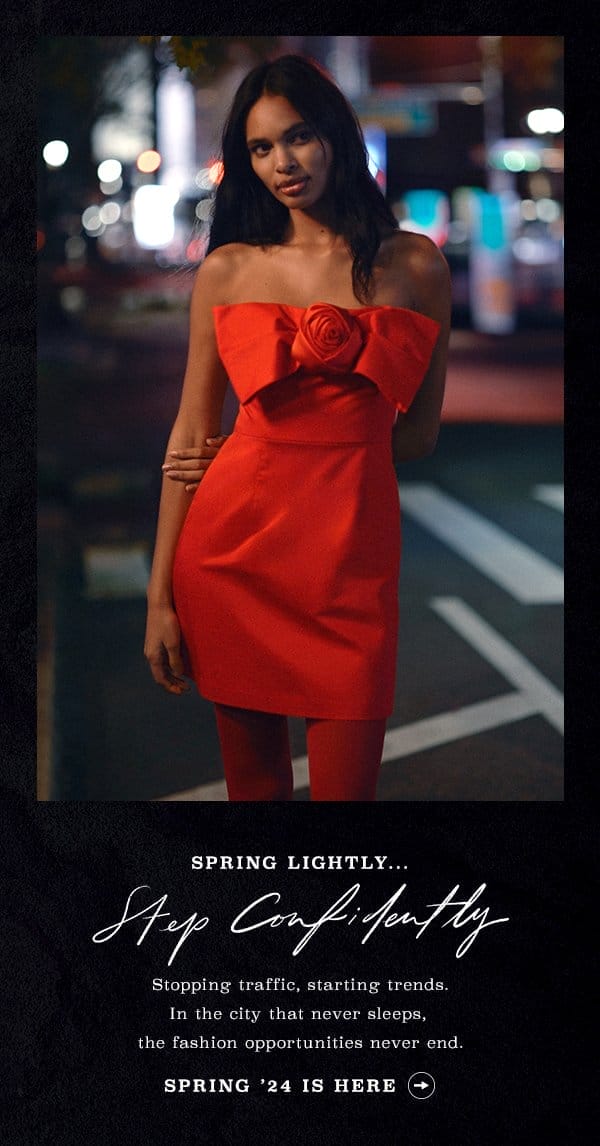 Woman in red strapless dress. Spring '24 is here.