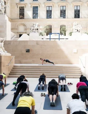 Grab Your Mat! The Louvre Is Hosting Yoga Sessions Ahead of the Olympics