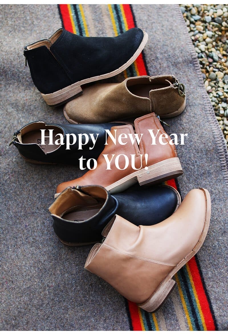 Boots on blanket with HNY message