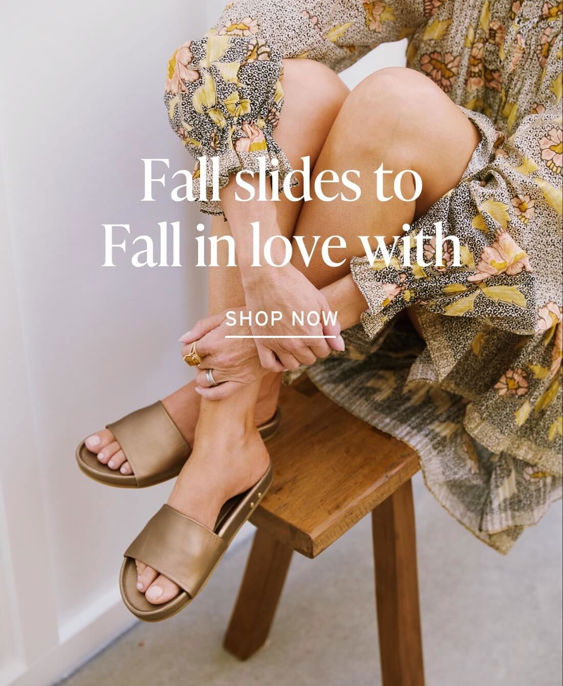 Fall slides on model in autumn floral dress