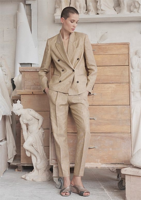 Model Wears Brunello Cucinelli - Two-Tone Viscose Linen Blazer Jacket with Gold Monili Trim and Two-Tone Cuffed Straight-Leg Pants