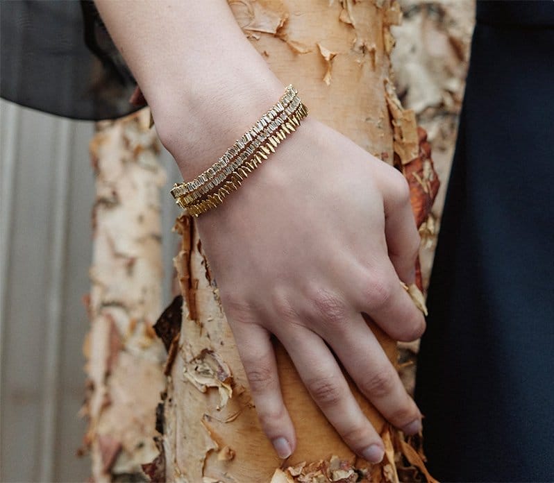 Model wears Suzanne Kalan - 18K Yellow Gold Tennis Bracelets