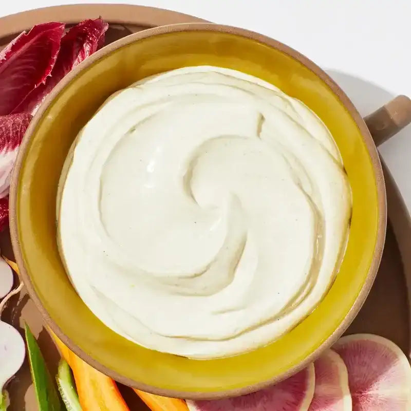 crudite and whipped tofu on a white background