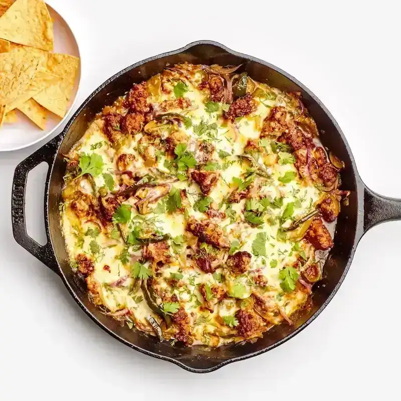 Cheesy Pork in a cast iron skillet 