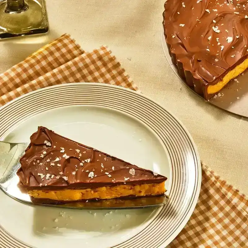 A slice of Hazelnut Butter Cup Tart