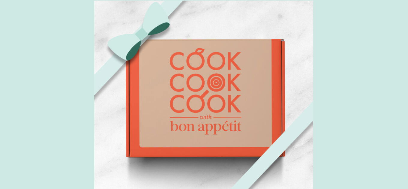 Cook with Bon Appétit box with a light blue ribbon around it.