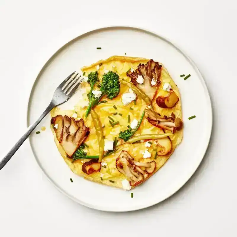 A tortilla vaga on a white plate on a white background 