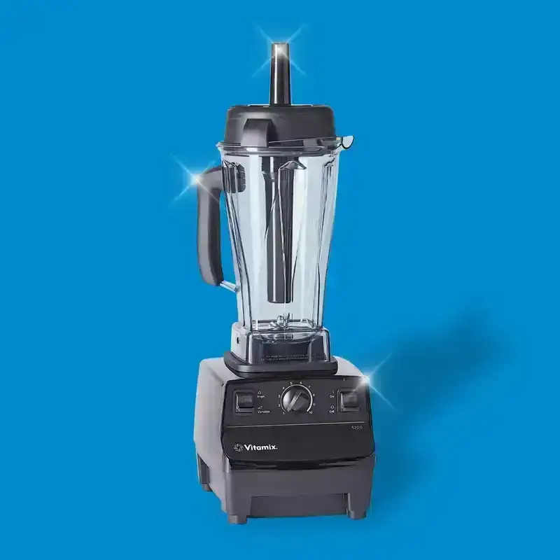 The Vitamix 5200—our pick for the best blender—on a blue background.