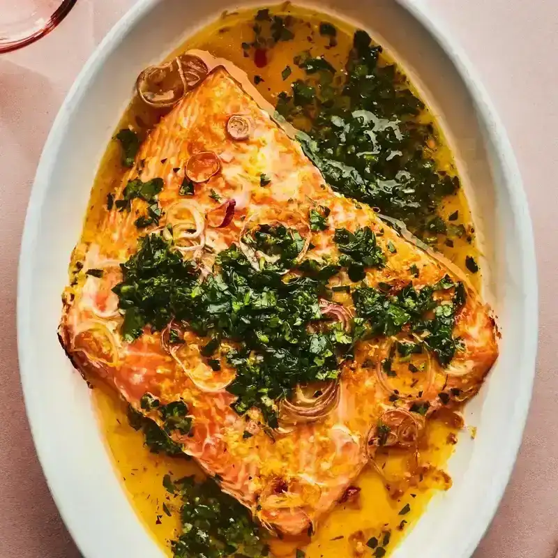 Large fillet of salmon topped with an herby salsa verde.