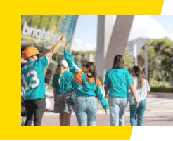 Miami Dolphins fans at Brightline station.