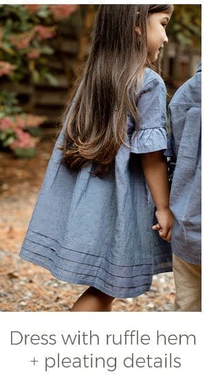 Dress with ruffle hem + pleating details!