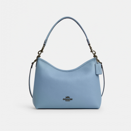 A 1966 Coach classic, updated for today in a sleek new silhouette.