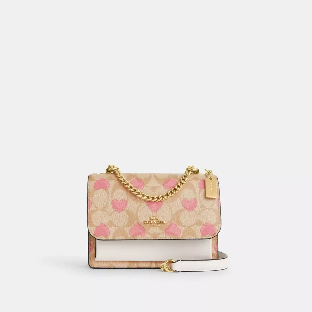 Mini Klare Crossbody In Signature Canvas With Heart Print