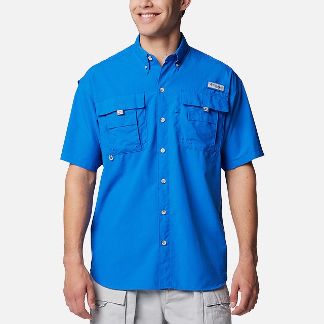 Model in a blue button up fishing shirt.