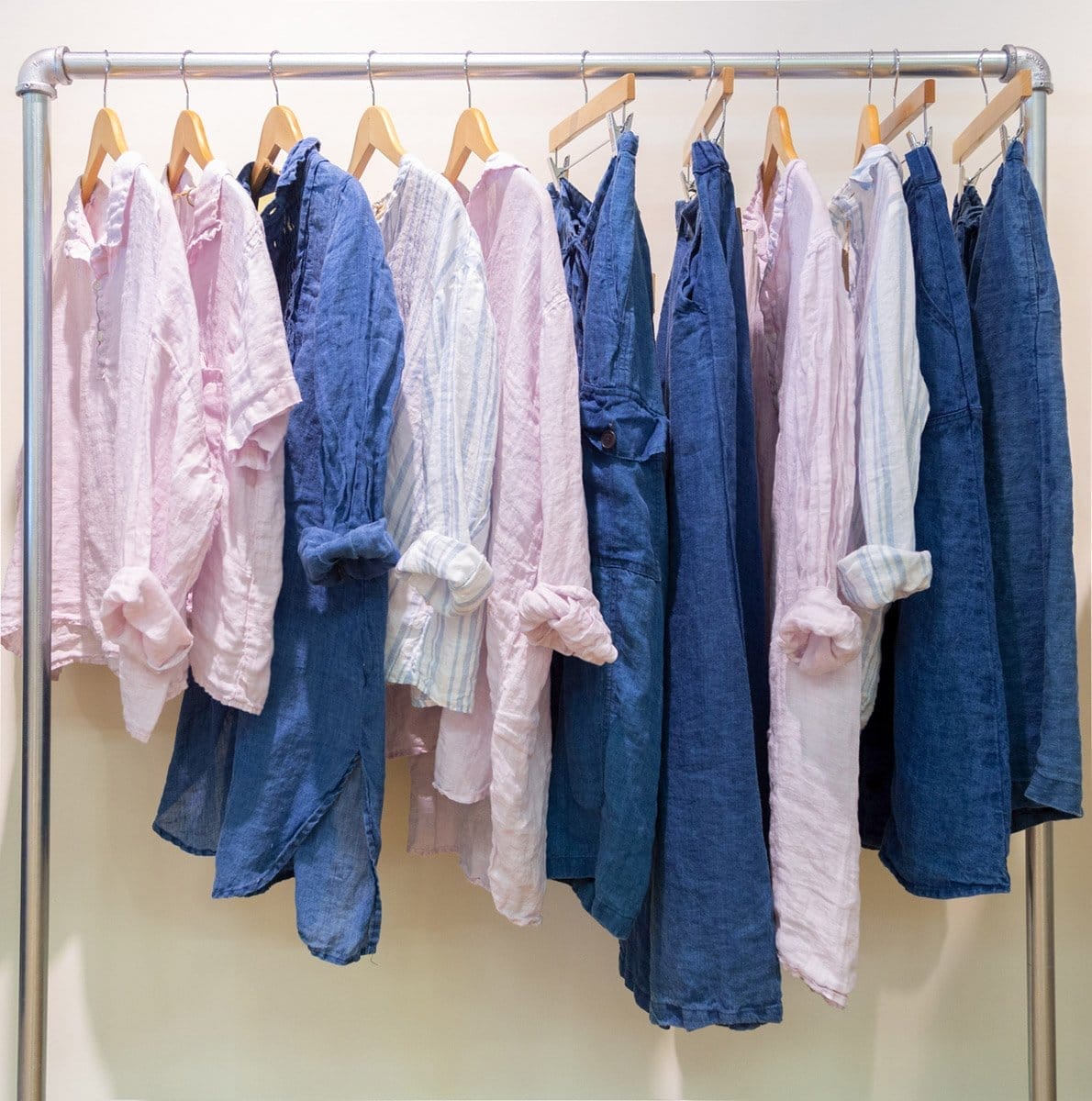 Rack of Linen clothing indigo and seafoam color