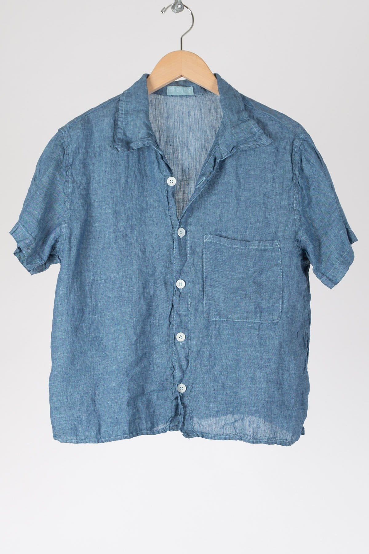 linen shirt Collared camp shirt with a square front pocket and longer short sleeves