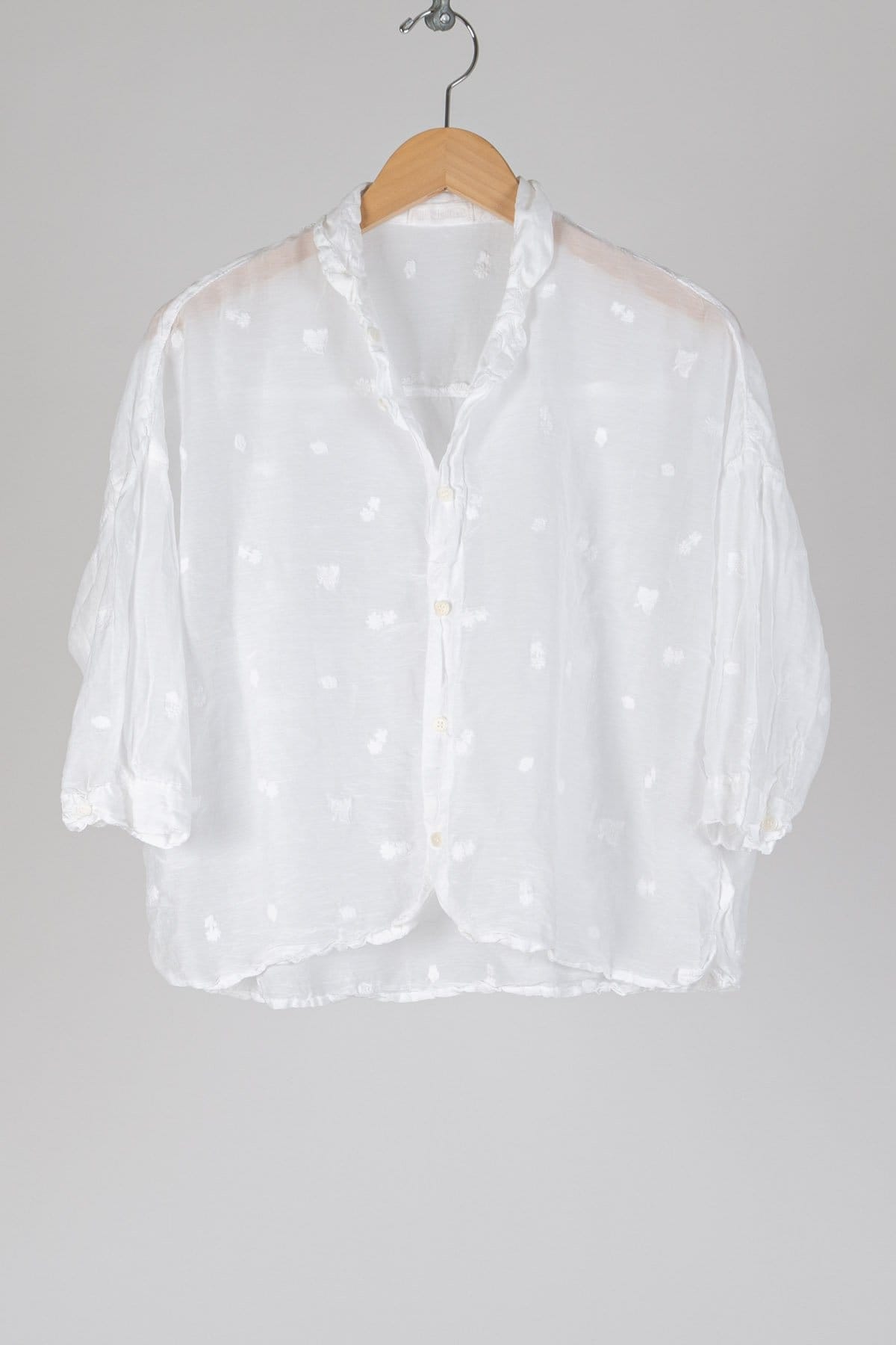 Boxy cropped button up shirt with a cuffed ¾ sleeve and dropped shoulder, in embroiderd cottonsilk