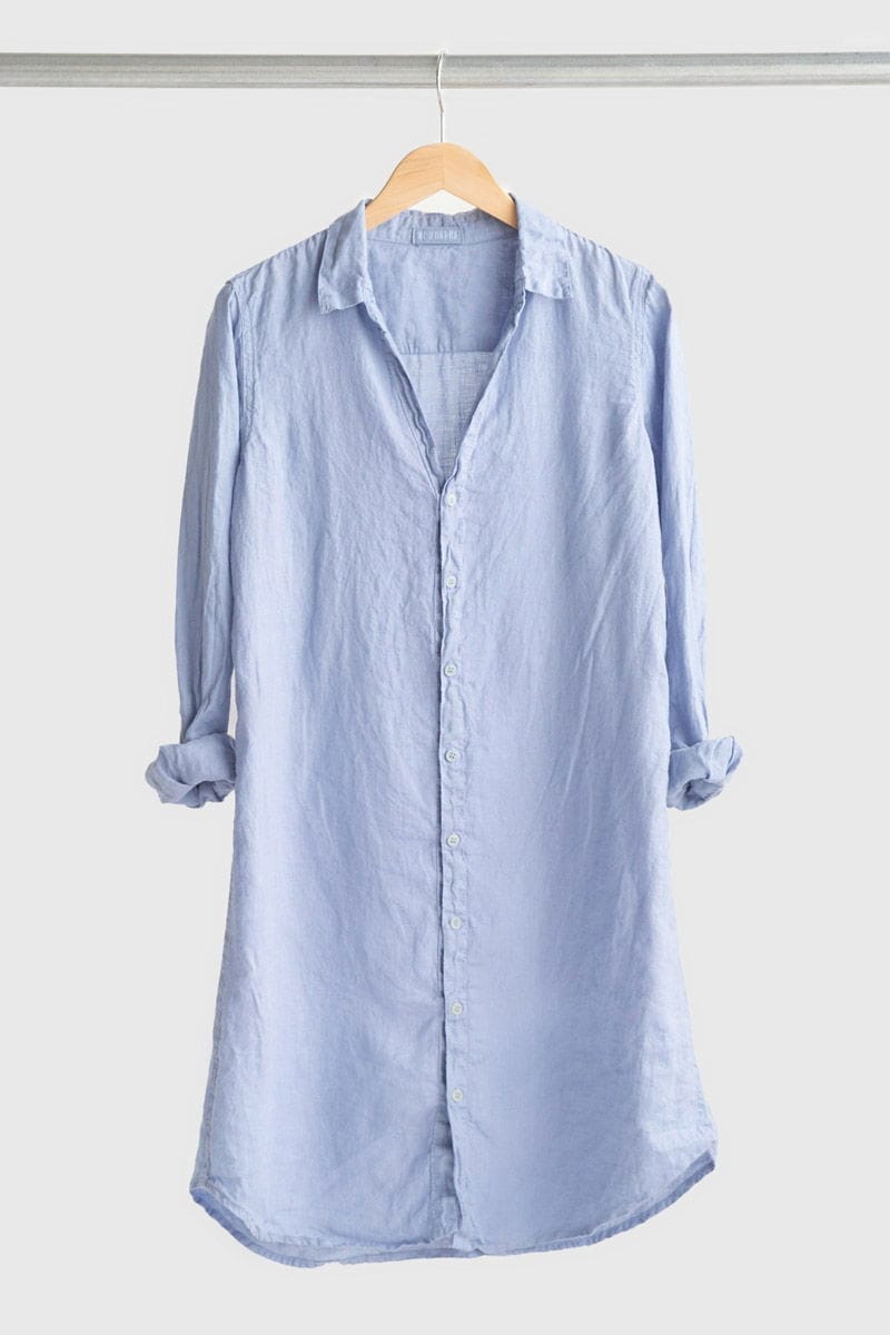 Linen Shirt Dress in blue Hangin on a Rack