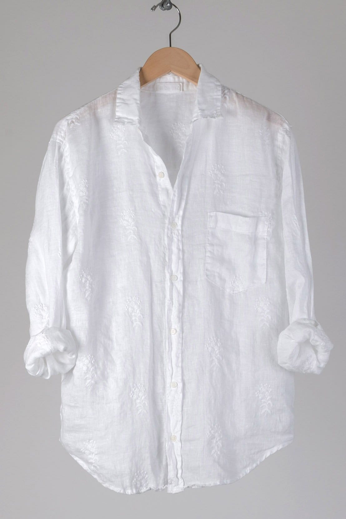 Button up collared shirt with a bust patch pocket and a box pleat on the back in embroidered Linen