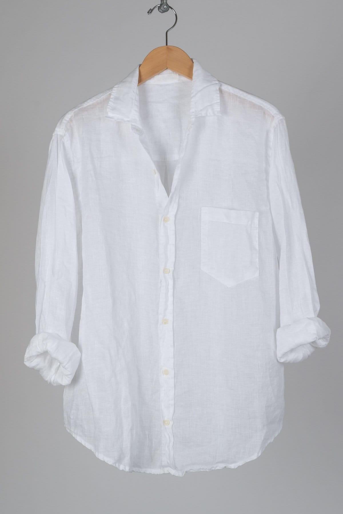 white linen button down with pocket on chest