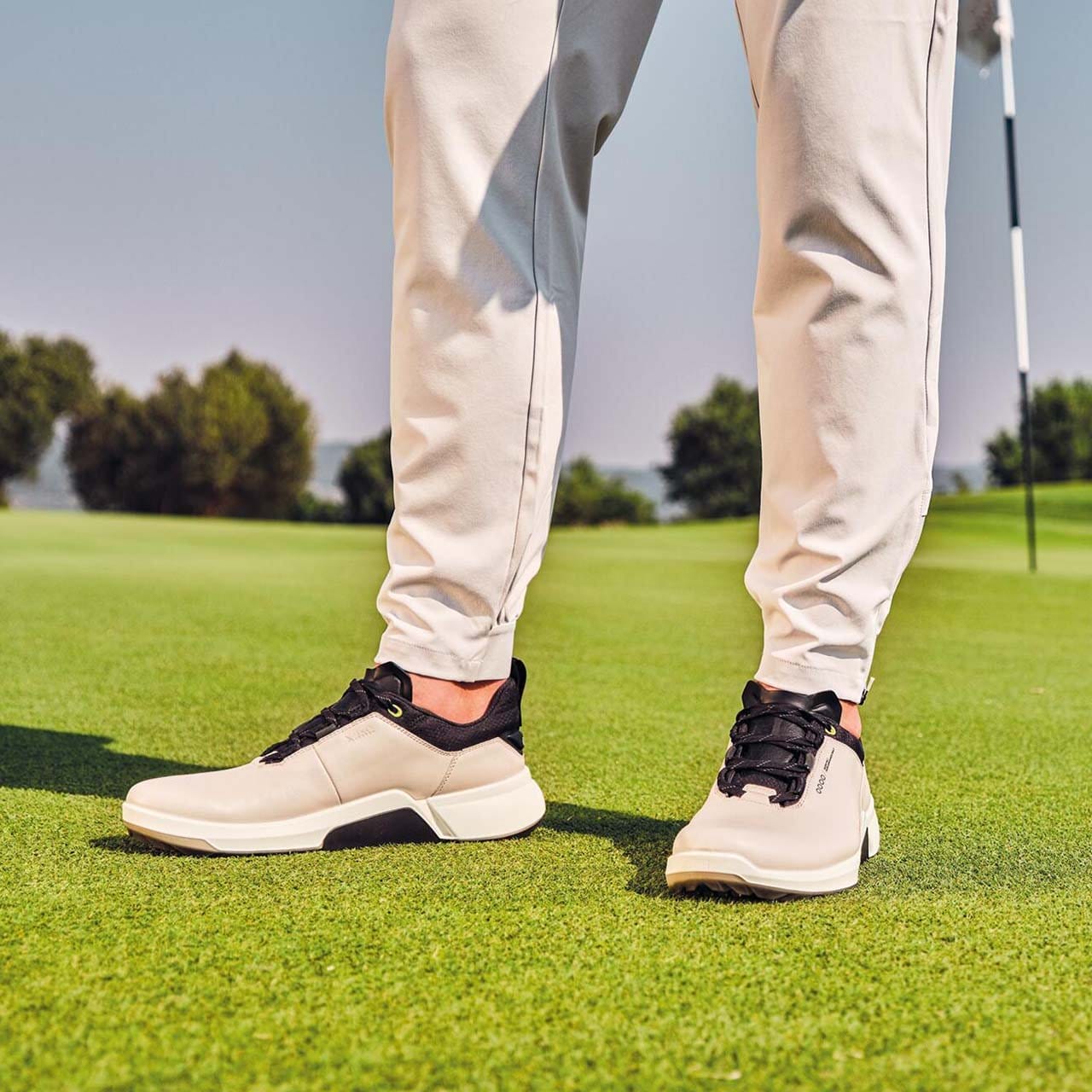 Model wearing golf shoes