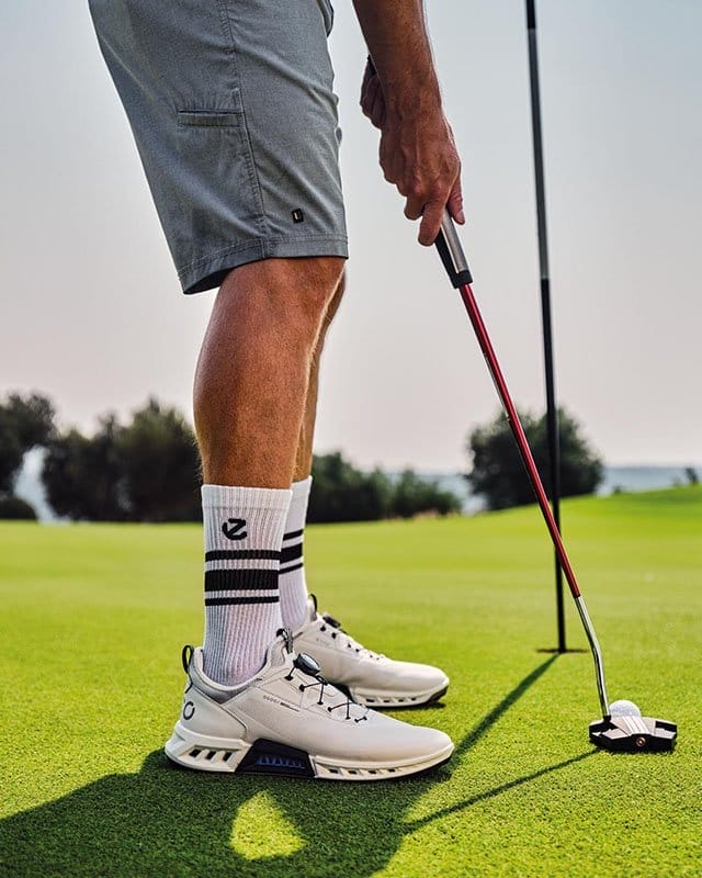 Man on putting green