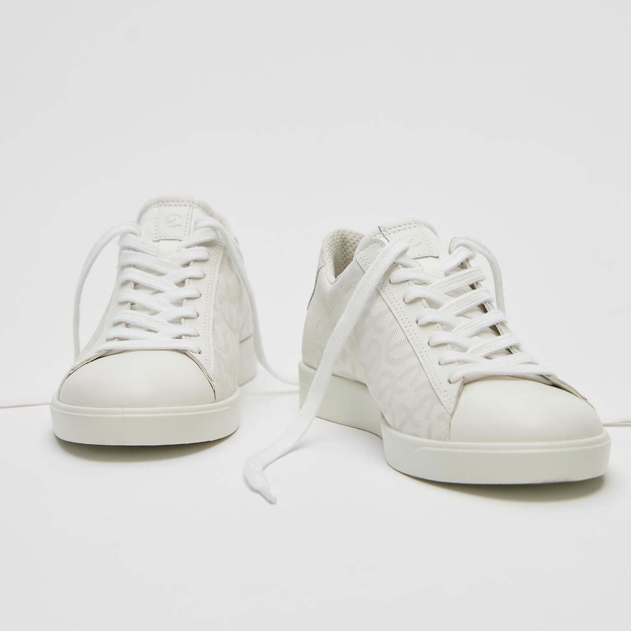 Pair of white sneakers