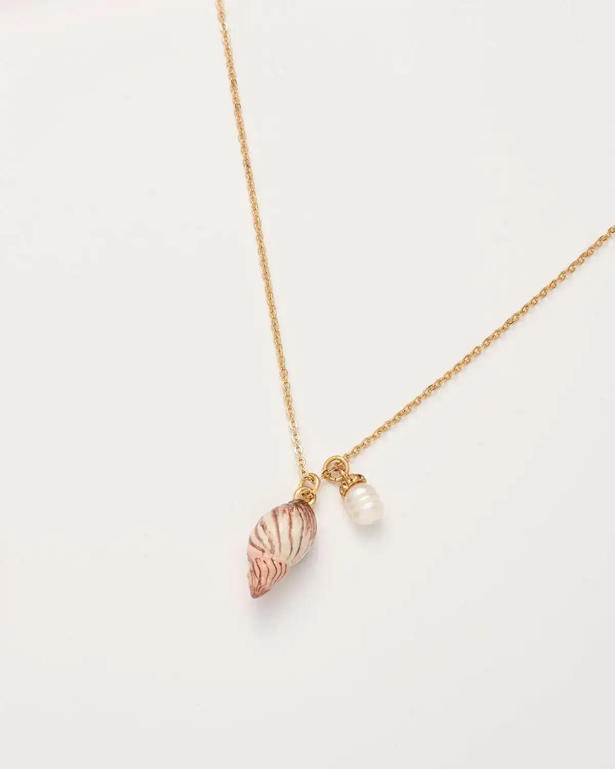 Image of Spiral Shell and Pearl Worn Gold Short Necklace