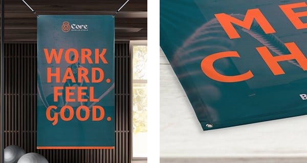 A fabric banner hangs in the Core Exercise Studio. It reads 'WORK HARD FEEL GOOD'. A close-up image of the banner shows a seamless edge, and grommets for hanging.