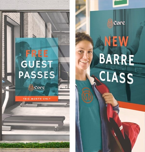 Two branded poster prints entice gym-goers. One reads “FREE GUEST PASSES” while the other reads “NEW BARRE CLASS.”