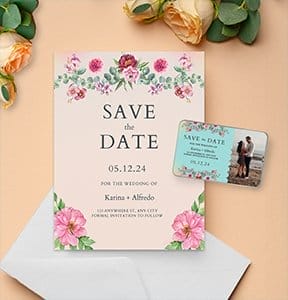 A save the date card is held onto a refrigerator with a photo magnet.