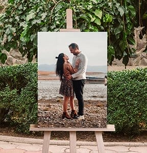 A canvas print pictures the happy couple together.