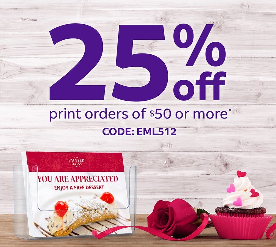 Cupcakes and note cards rest on a surface with the offer '25% off print orders of \\$50 or more code: E M L 5 1 2' displayed above them. Offer ends February 12, 2024.