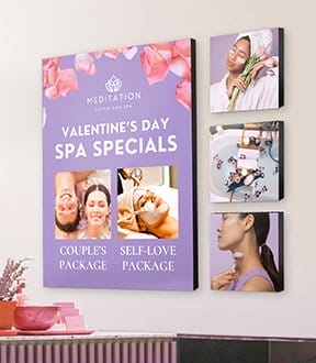 A purple photo poster hangs on a wall advertising 'VALENTINE’S DAY SPA SPECIALS.'
