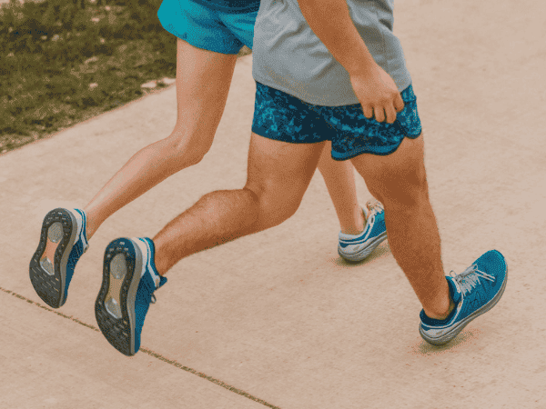 Man and woman wearing Karhu shoes