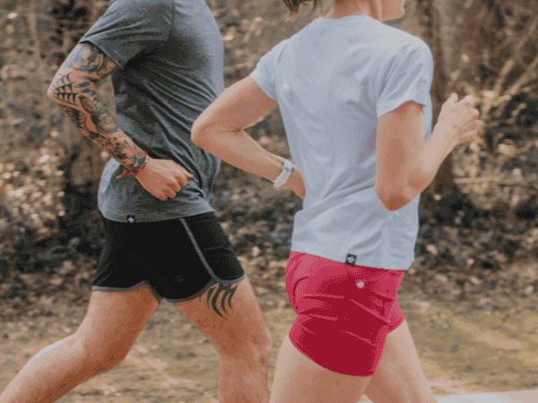 Man and woman running together in rabbit apparel