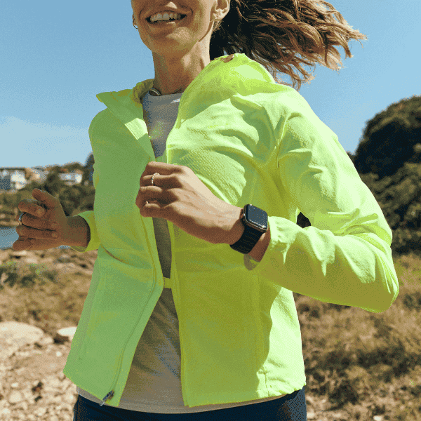 Woman wearing a Brooks jacket