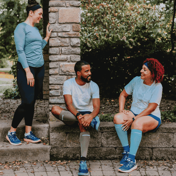 Group of people wearing running apparel and gear