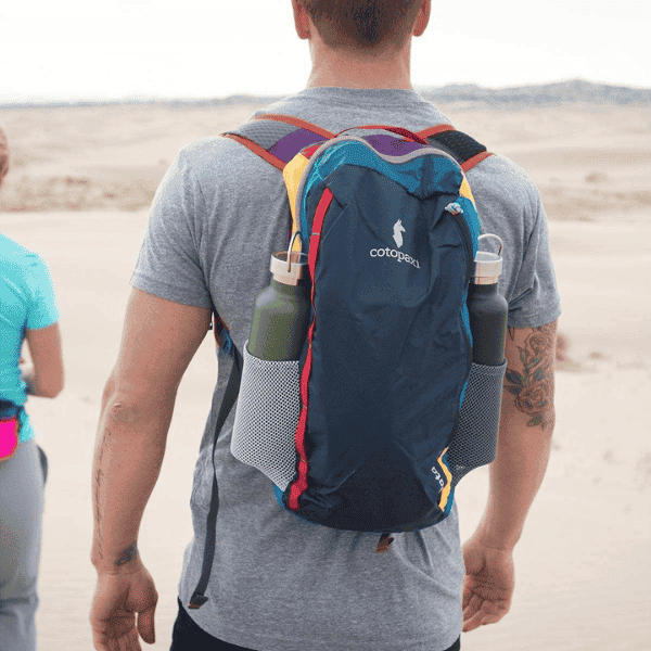 Man wearing a Cotopaxi backpack