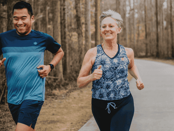 Man and woman running in rabbit apparel