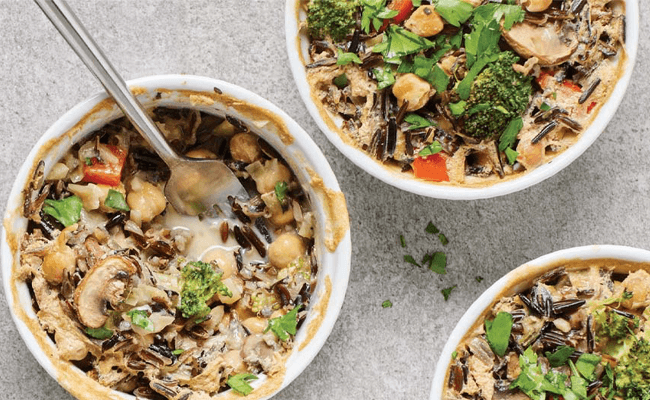 Individual Broccoli and Wild Rice Casseroles in white ramekins