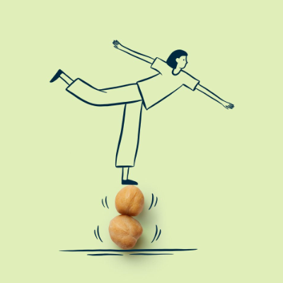 Cartoon drawing of a person balancing on one leg, standing on two chickpeas