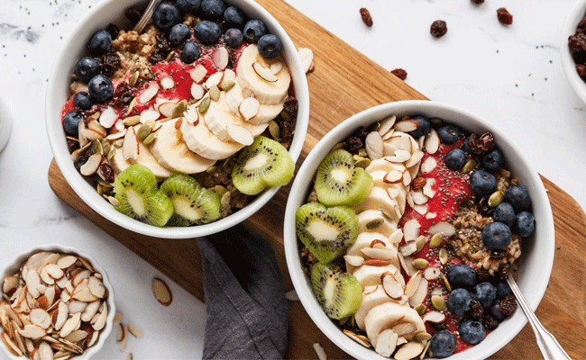 Two white bowls of Berry-Licious Overnight Oatmeal