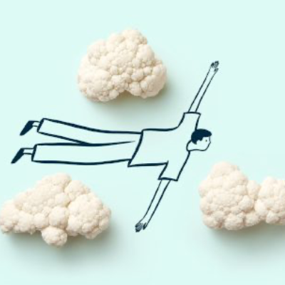 cartoon man flying through clouds of cauliflower